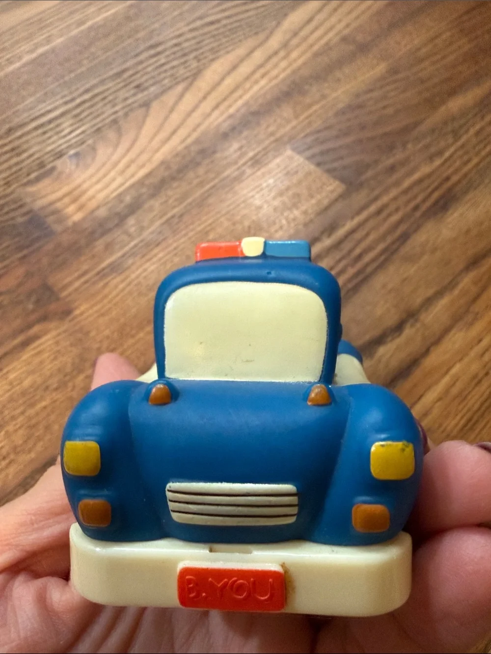Smiling Blue Police Car Toy for Kids - Soft Squeezable Play Vehicle